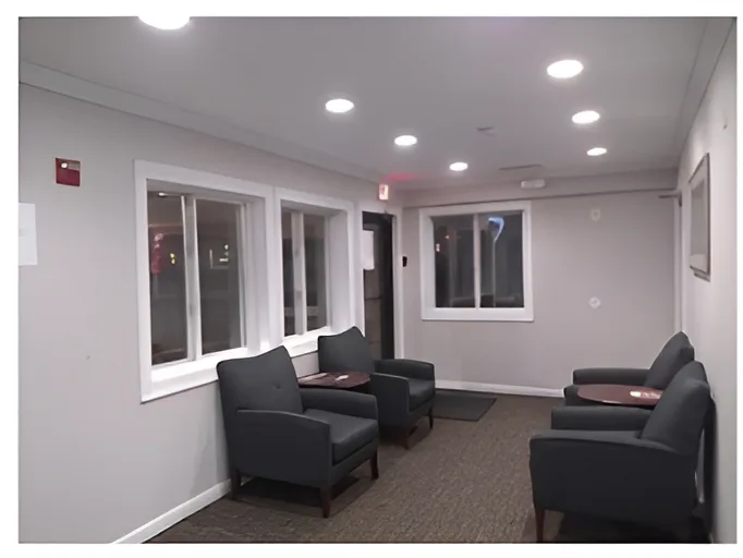 Red Crown Inn lobby — comfortable seating area with warm lighting
